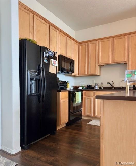 kitchen with dark hardwood / wood-style floors, sink, light brown cabinets, and black appliances