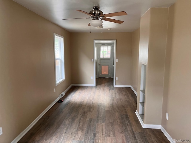 4875 Lowell Blvd, Denver, CO 80221 - unfurnished room featuring a ceiling fan and dark wood-type flooring