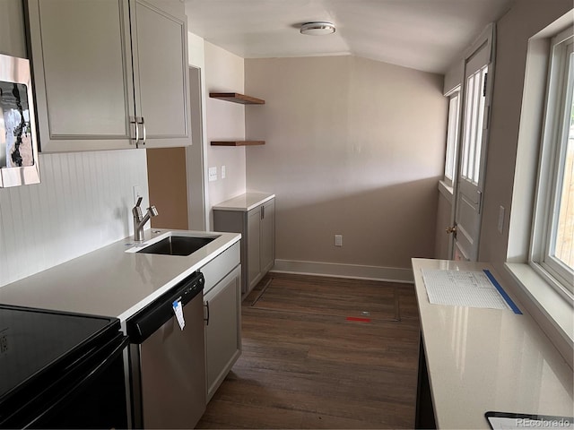 4875 Lowell Blvd, Denver, CO 80221 - kitchen featuring appliances with stainless steel finishes, open shelves, dark wood finished floors, light countertops, and gray cabinets