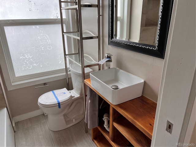 4875 Lowell Blvd, Denver, CO 80221 - bathroom featuring toilet and vanity