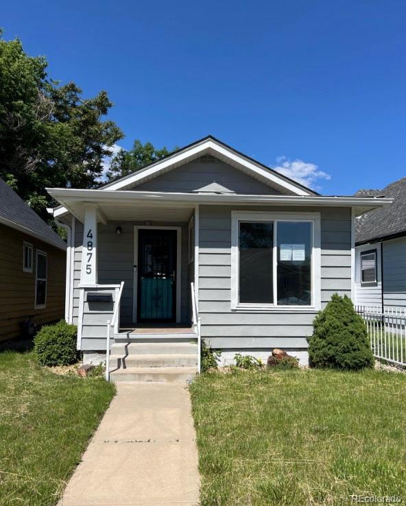 4875 Lowell Blvd, Denver, CO 80221 - view of front of property with a porch
