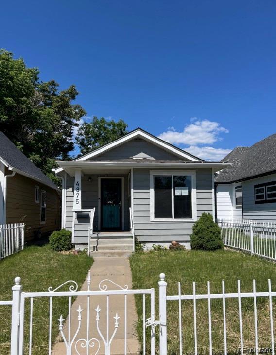 4875 Lowell Blvd, Denver, CO 80221 - view of front facade featuring covered porch