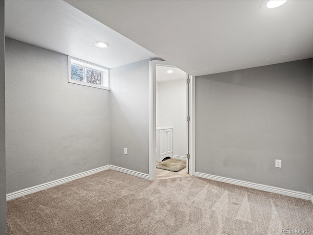 basement with light carpet