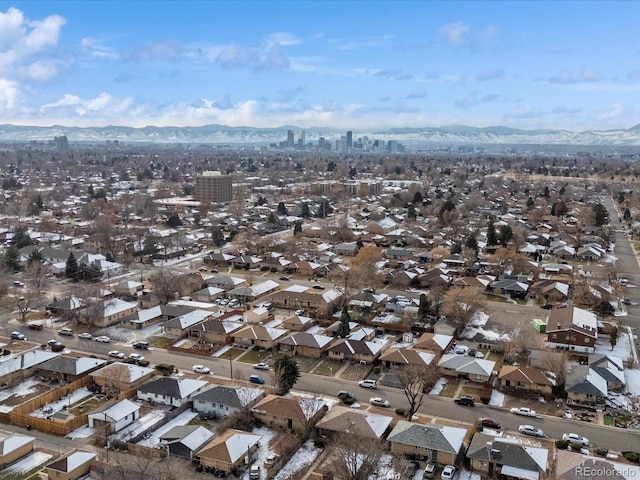 birds eye view of property featuring a mountain view