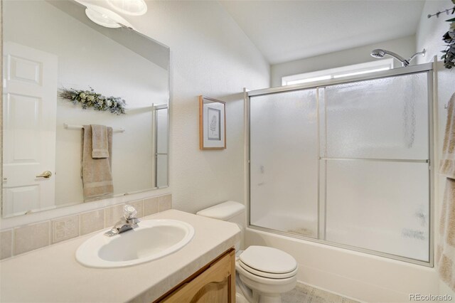 688 Tiara Rd, Lake George, CO 80827 - bathroom with toilet, vanity, and enclosed tub / shower combo