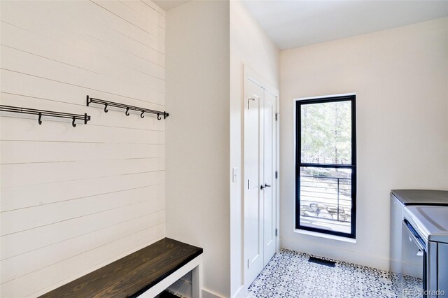 30298 San Isabel Rd, Buena Vista, CO 81211 - mudroom featuring washer and dryer and baseboards