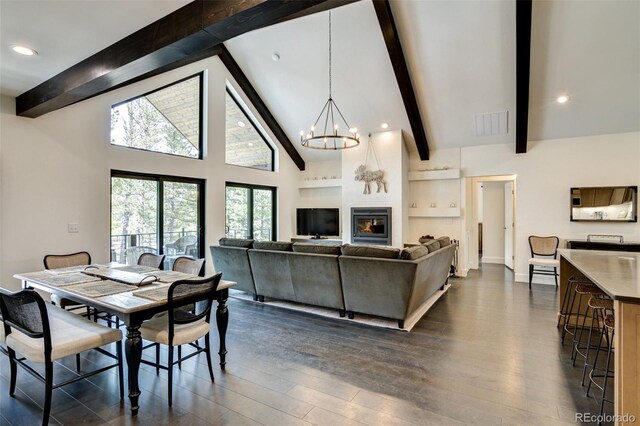 30298 San Isabel Rd, Buena Vista, CO 81211 - dining area featuring beamed ceiling, a chandelier, dark wood finished floors, recessed lighting, and high vaulted ceiling