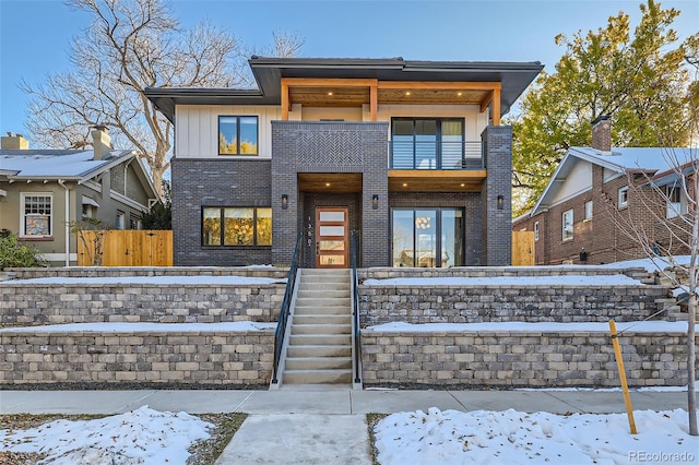 contemporary home featuring a balcony