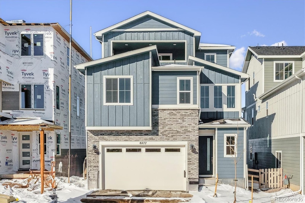 view of front of property with a garage