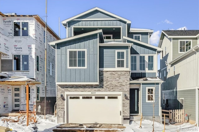 view of front of property with a garage