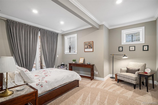 bedroom featuring crown molding, baseboards, and light carpet