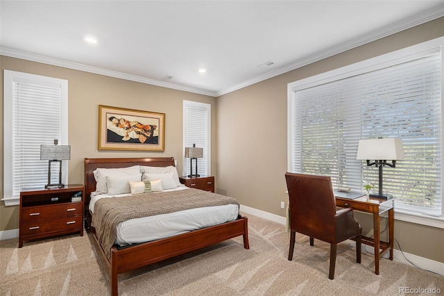 bedroom featuring ornamental molding, baseboards, light colored carpet, and visible vents