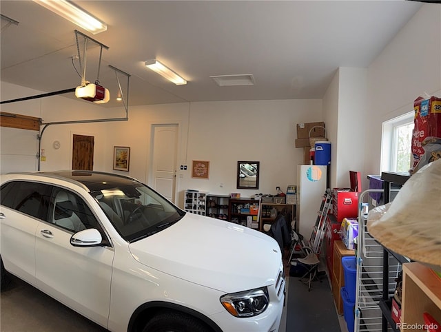 garage featuring a garage door opener