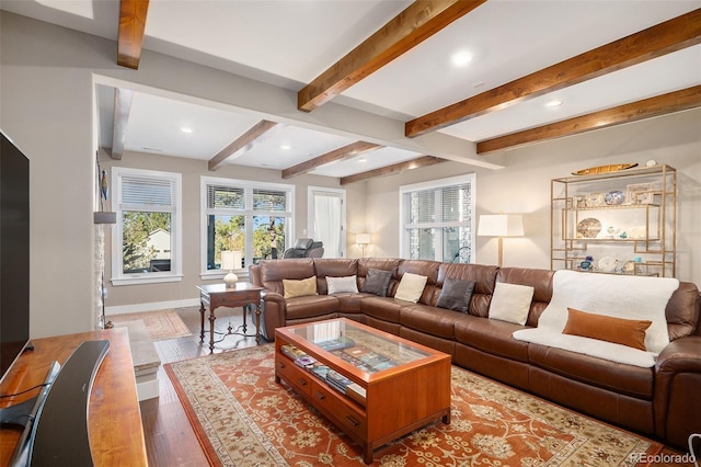 living room with recessed lighting, baseboards, beam ceiling, and wood finished floors