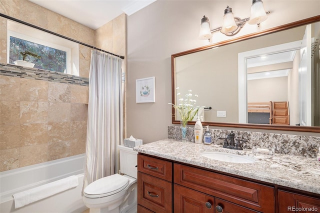 full bath with shower / tub combo, vanity, and toilet