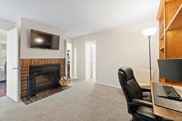 2306 S Troy St Unit A, Aurora, CO 80014 - carpeted office featuring baseboards and a fireplace