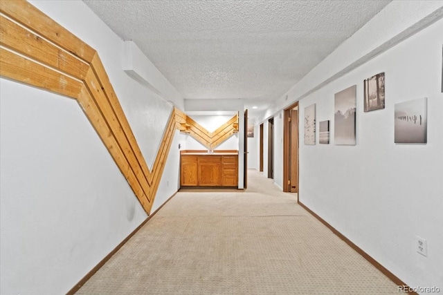 2306 S Troy St Unit A, Aurora, CO 80014 - corridor with a textured ceiling and light colored carpet
