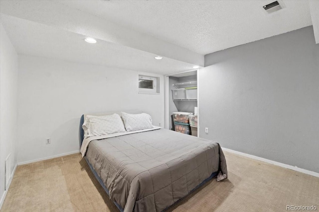 2306 S Troy St Unit A, Aurora, CO 80014 - carpeted bedroom with baseboards, a textured ceiling, visible vents, and recessed lighting