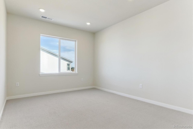 13900 Hanging Lake St, Parker, CO 80138 - spare room featuring baseboards, visible vents, recessed lighting, and light carpet
