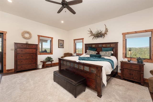 carpeted bedroom featuring ceiling fan