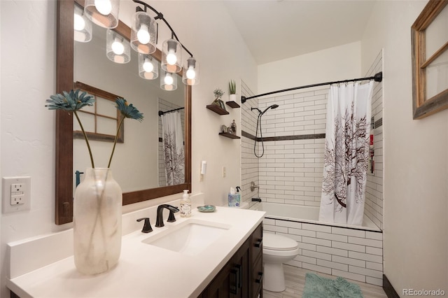 full bathroom with shower / bath combo, vanity, and toilet