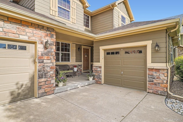 15056 Fillmore Way, Thornton, CO 80602 - garage with concrete driveway and covered porch