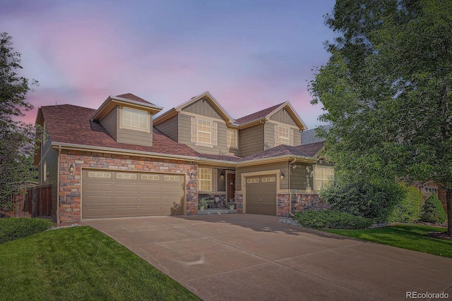 15056 Fillmore Way, Thornton, CO 80602 - craftsman-style home with a garage, driveway, stone siding, and board and batten siding