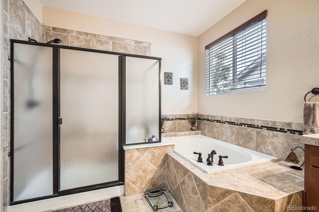 15056 Fillmore Way, Thornton, CO 80602 - bathroom featuring a garden tub and a stall shower