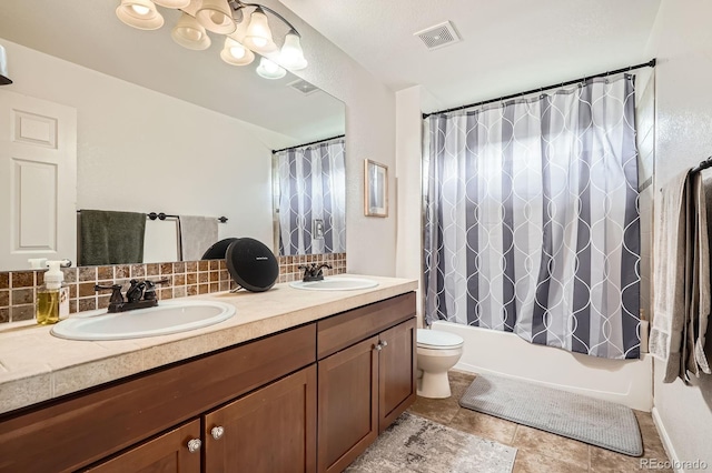 15056 Fillmore Way, Thornton, CO 80602 - bathroom with double vanity, decorative backsplash, shower / bath combo with shower curtain, and tile patterned flooring