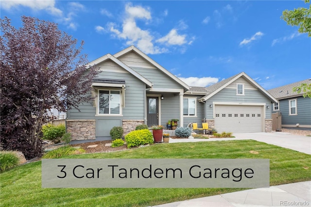 craftsman inspired home with a front yard and a garage