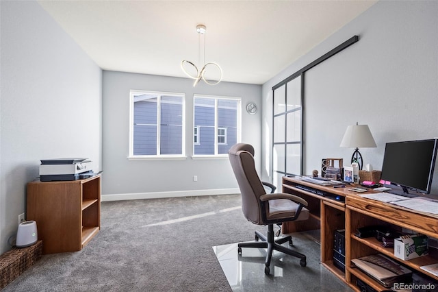 office area with carpet flooring and a chandelier