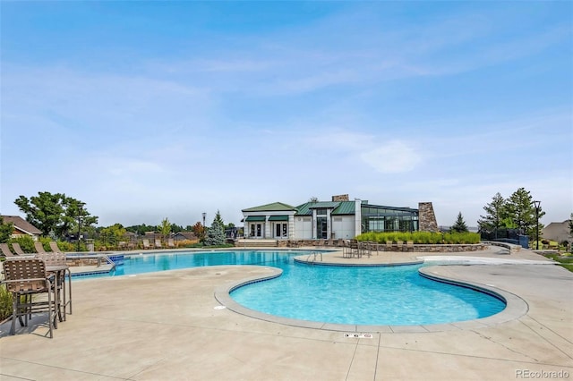 view of pool with a patio area