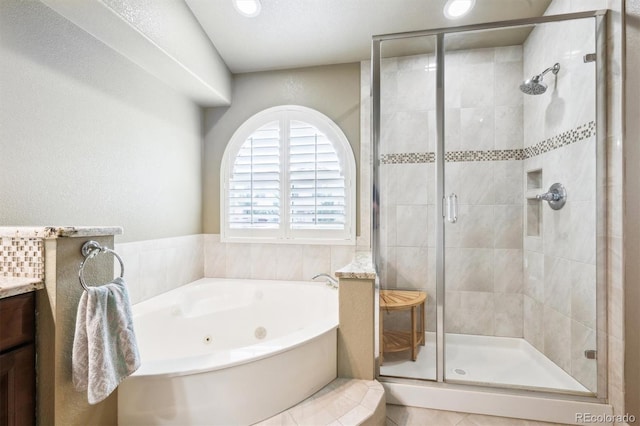 3305 White Oak Ln, Highlands Ranch, CO 80129 - bathroom featuring a whirlpool tub, a shower stall, vanity, and recessed lighting