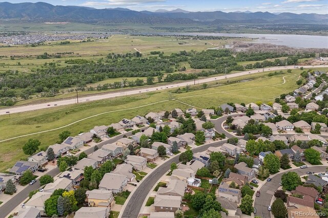 3305 White Oak Ln, Highlands Ranch, CO 80129 - aerial view of residential area featuring a water and mountain view