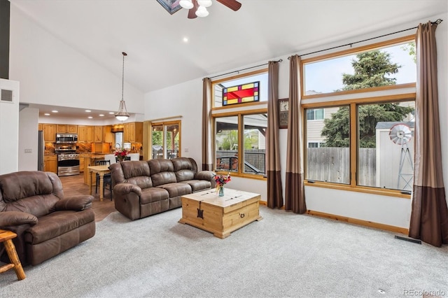 5282 Devon Ave, Castle Rock, CO 80104 - living room featuring high vaulted ceiling, light colored carpet, a ceiling fan, recessed lighting, and baseboards