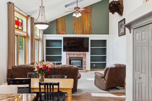 5282 Devon Ave, Castle Rock, CO 80104 - living room with a high ceiling, a ceiling fan, built in features, and a fireplace