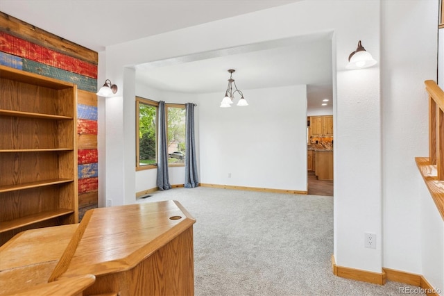 5282 Devon Ave, Castle Rock, CO 80104 - unfurnished office featuring baseboards, carpet, and a chandelier