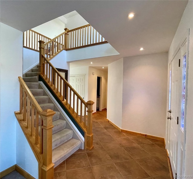 5282 Devon Ave, Castle Rock, CO 80104 - entrance foyer featuring baseboards, stairway, recessed lighting, and tile patterned flooring