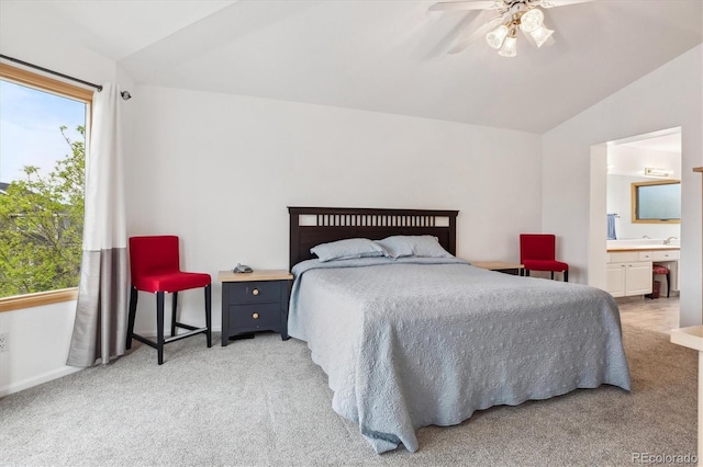 5282 Devon Ave, Castle Rock, CO 80104 - bedroom with lofted ceiling, light colored carpet, connected bathroom, ceiling fan, and baseboards