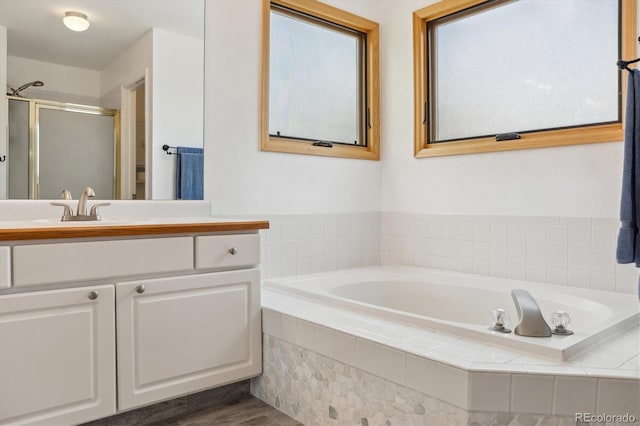 5282 Devon Ave, Castle Rock, CO 80104 - bathroom with a stall shower, vanity, and a garden tub