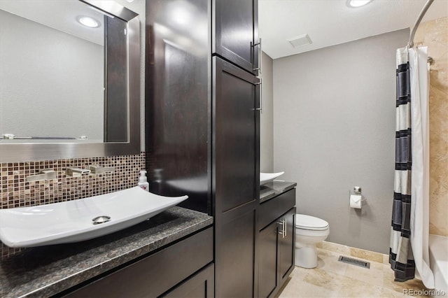 5282 Devon Ave, Castle Rock, CO 80104 - bathroom featuring vanity, toilet, a shower with curtain, tasteful backsplash, and baseboards
