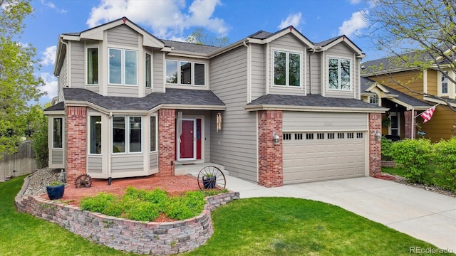 5282 Devon Ave, Castle Rock, CO 80104 - view of front of house featuring brick siding, a garage, concrete driveway, and roof with shingles