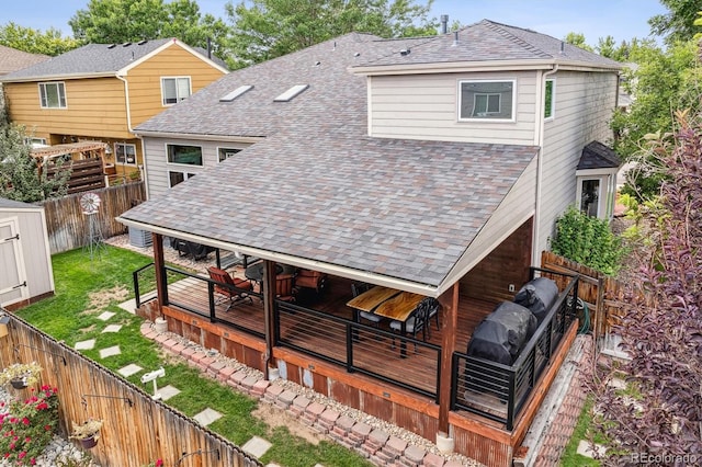 5282 Devon Ave, Castle Rock, CO 80104 - back of property with roof with shingles and a deck