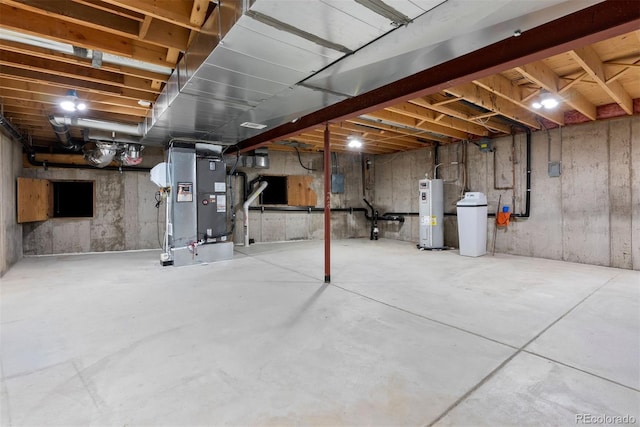 basement with water heater and heating unit