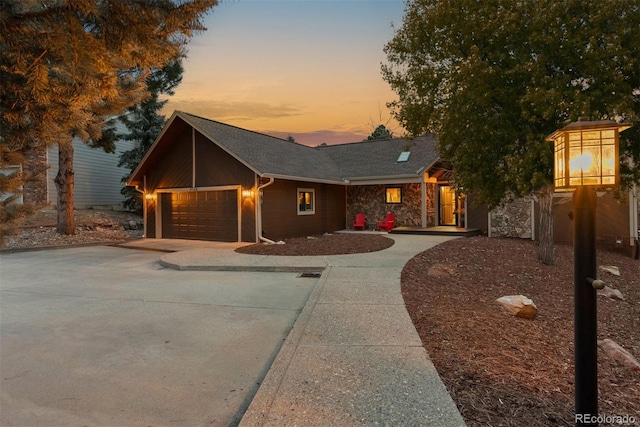 view of front of property with a garage