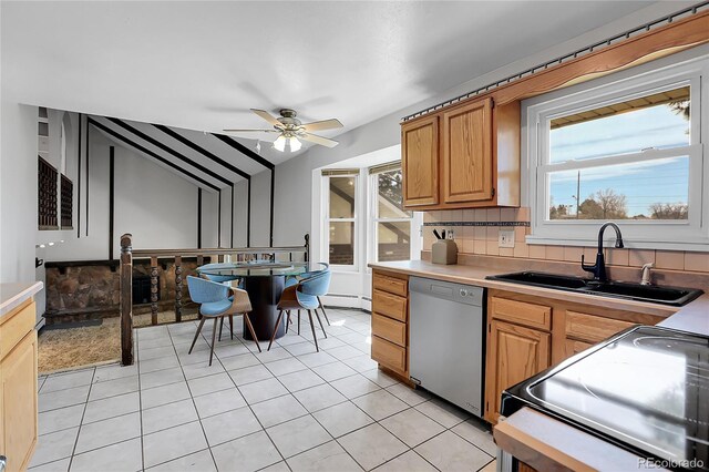 kitchen featuring dishwasher, a sink, black electric range, ceiling fan, and light tile patterned floors