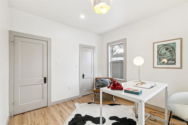 home office featuring light hardwood / wood-style flooring