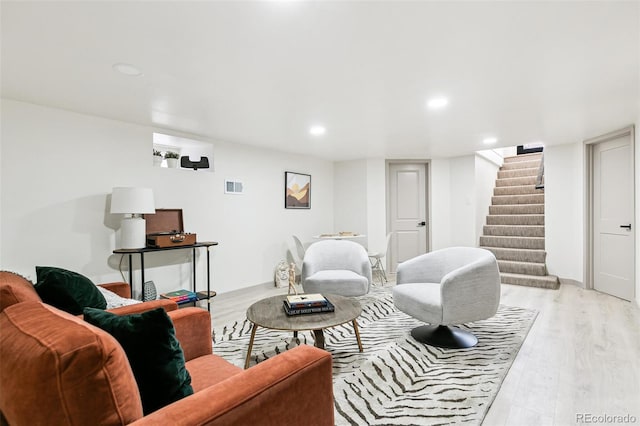 living room with light hardwood / wood-style floors