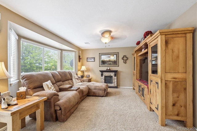 23634 Broadmoor Dr, Parker, CO 80138 - living room with light carpet, a stone fireplace, and ceiling fan
