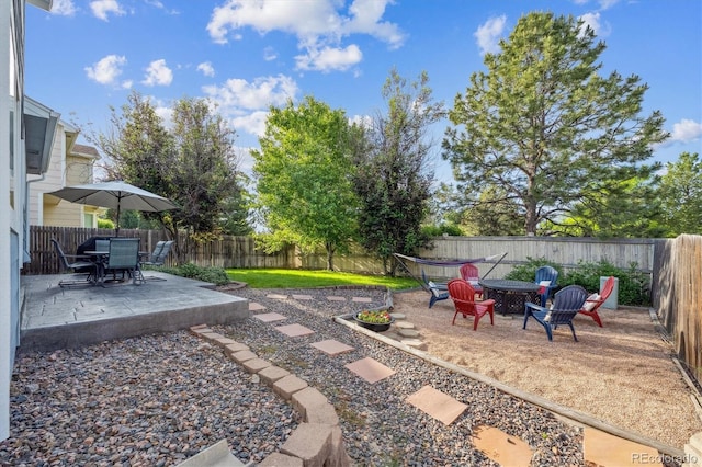 23634 Broadmoor Dr, Parker, CO 80138 - fenced backyard with a patio area and outdoor dining area